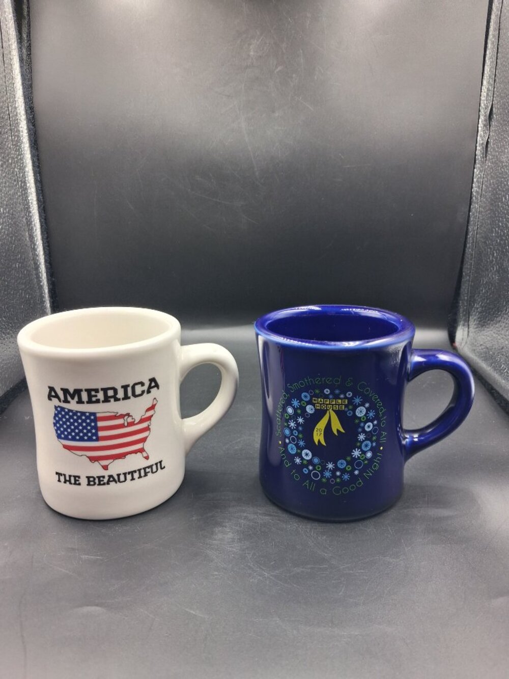 2 Waffle House Tuxton Coffee Mugs 2012 America & 2017 Blue Christmas Wreath EUC